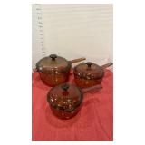 Vision Corning pans and lids in brown