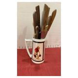 Bowling theme coffee mug full of knives