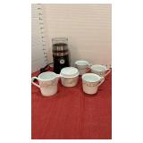 American Limoges Flowers creamer and sugar bowl with china cups and a coffee grinder