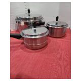 Stainless steel soup pot and double boiler.