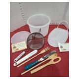 Tupperware, utensils, recipe cards.