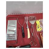 Fish filet knife with case and other kitchen utensils.