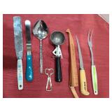 Fish filet knife with case and other kitchen utensils.
