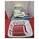 Dish drainers and used kitchen towels.