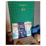 Yarn, knitting needles, craftbooks, Omnigrid mats