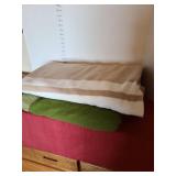 Two blankets, green is electric but missing cord