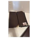 Portfolio, candle holder, photo albums and address book