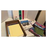 Notepads, hanging file folders, paper and more
