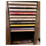 CDs in tower, 37in tall