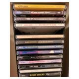 CDs in tower, 37in tall