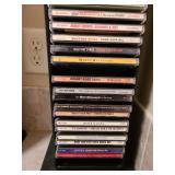 CDs in tower, 37in tall