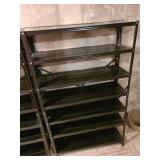 Black metal shelving unit, 59x36x12, in basement