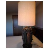 Spanish revival style table lamp in wood with plastic amber panels, lighting in upper and lower sections, 46in tall
