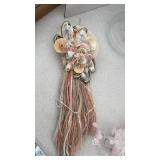 Shell decor, candles and bouquet