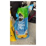 Miracle Gro potting mix one 1/4 and one 1/2 full