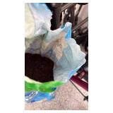 Miracle Gro potting mix one 1/4 and one 1/2 full