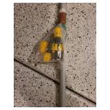 Snow shovel and telescopic light bulb changing pole.