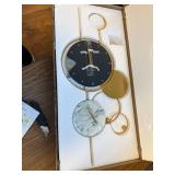 $90 Gold Metal Wall Clock 15x30in, Battery-Operated, Silent