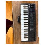$149 37-key MIDI keyboard controller with 16 backlit drum pads, touch