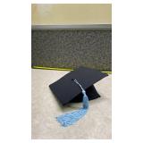 Traditional Graduation Cap with Light Blue Tassel