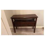 Traditional Brown Console Table with Shelf and Two Drawers (approximately 3 foot across 1 foot deep and 2 foot 4 inches tall)