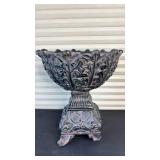 Ornate Resin Decorative Urn (approximately 12 inches tall and 9 inches diameter- one leg chipped-does not seem to effect balance on solid surface)