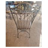 WROUGHT IRON DINING TABLE with a GLASS TOP and FOUR CHAIRS