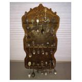 COLLECTION OF SOUVENIR SPOONS AND WOOD SPOON HOLDER