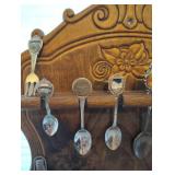 COLLECTION OF SOUVENIR SPOONS AND WOOD SPOON HOLDER