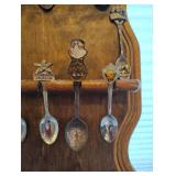 COLLECTION OF SOUVENIR SPOONS AND WOOD SPOON HOLDER