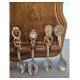 COLLECTION OF SOUVENIR SPOONS AND WOOD SPOON HOLDER