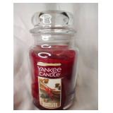 Nearly Full Yankee Cinnamon Candle with Red Perfume Bottle Wrapped in Wire Decor