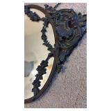 Ornate Black Plastic Framed Oval Wall Mirror with Chain (approximately 10 inches diameter)