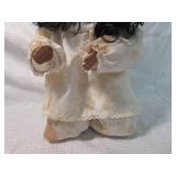 Porcelain Doll with Black Hair and White Dress