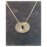 Gold Tone Necklace with Triple Ring Pendant