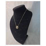 Gold Tone Necklace with Triple Ring Pendant