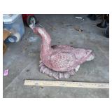 Large pinkish outdoor concrete goose decor