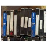Lot of VHS:  Dracula, Air Force One; and Sony & other brand VHS Tapes with handwritten labels.