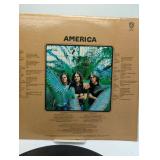America Self-Titled LP & 101 Strings Gold Award Hits Records LP. 2 LPs, vintage used condition, as is.