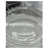 Multiple cooking items, see lot images. Anchor Hocking Glass Measuring Cup Set of 2, 10 1/2 inch wide skillet, 1 set silverware, 3 funnels, & 1 glass 7 cup microwave safe glass bowl. Used, as is.