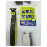 Self Care lot of 4: Braun Series 5513 Hair and Beard Trimmer Kit, Philips Norelco One Blade, Waterpik base & Set of Waterpiks, Philips Toothbrush charger base. 4 items in lot.