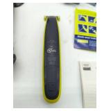 Self Care lot of 4: Braun Series 5513 Hair and Beard Trimmer Kit, Philips Norelco One Blade, Waterpik base & Set of Waterpiks, Philips Toothbrush charger base. 4 items in lot.