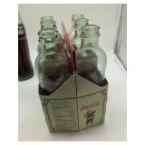 Coca-Cola Holiday 1899 Edition 6-Pack with Carrier, 1 coke bottle Austin TX, 1 coke bottle San Francisco. 8 bottles total.