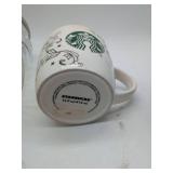 Various glassware & 2 mugs, including 1 Starbucks brand.