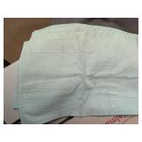 8 Placemats total: 4 light sage green, 4 brown. In good used condition, as is.