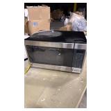 GE1.0 cu. ft. 1050-Watt Convection Countertop Microwave in Stainless Steel (rotator plate off kilter) - Retail: $0