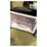 GE1.0 cu. ft. 1050-Watt Convection Countertop Microwave in Stainless Steel (rotator plate off kilter) - Retail: $0