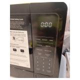 0.7 cu. ft. 700-Watt Countertop Microwave in Black - Retail: $65