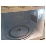 0.7 cu. ft. 700-Watt Countertop Microwave in Black - Retail: $65