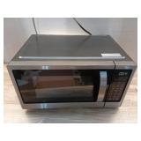 21 in. 1.1 cu. ft. 1000-Watt Countertop Microwave Oven in Fingerprint Resistant Stainless Steel and Bar handle - Retail: $109